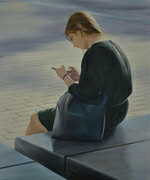 young woman sits on granite bench while looking at her mobile phone
