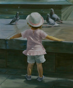 small child looks at pigeons with enchantment