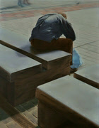 poor man sitting on a bench