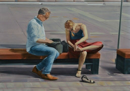 preoccupied couple sitting on a bench