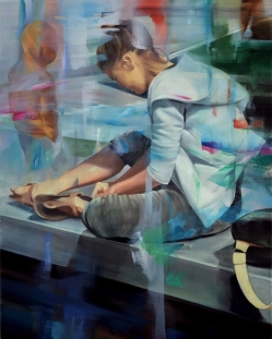 young woman sits on a bench and apparently being lost in aimless day-dreaming